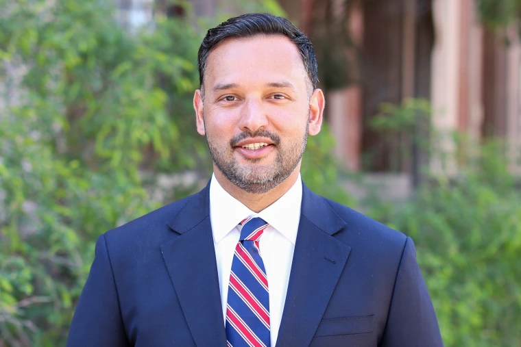 headshot of Daniel Saud smiling directly at the camera